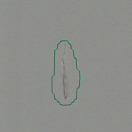 Loose thread, 26 by 60 mm, on grey fabric